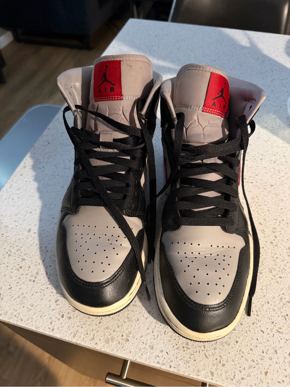 Jordan Women's High-Top Sneaker - Black and Gray with Red Accents